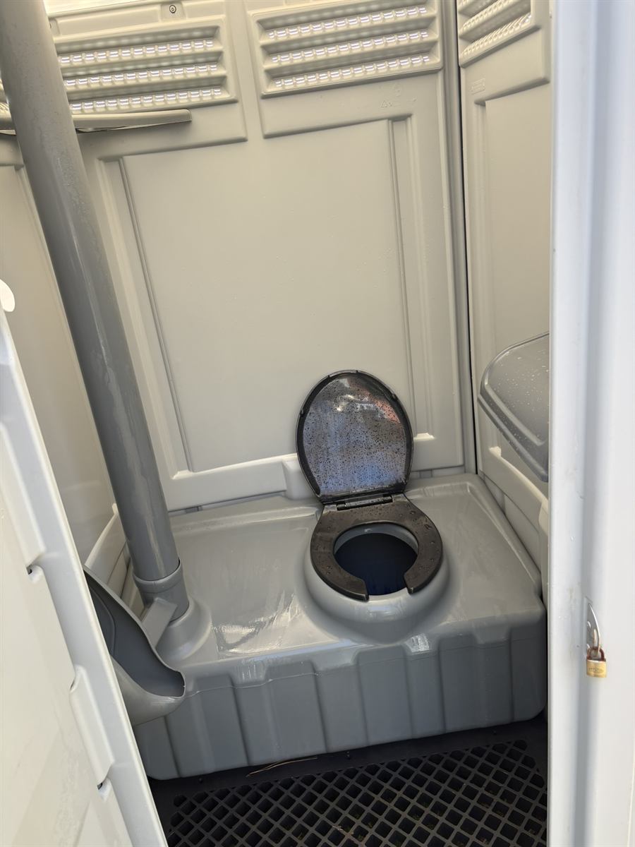 Clean interior of a Carolina Sanitation portable restroom